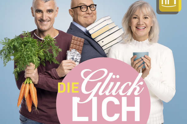 Das hr1-Team steht vor einem blauen Hintergrund, daneben steht "Die Glücklichmacher".